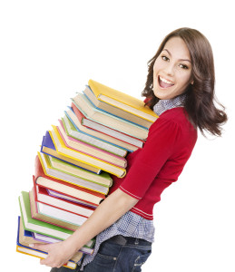 bigstock-Girl-with-pile-color-book--Is-21192884