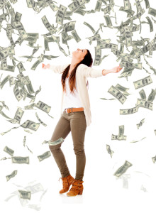 bigstock-Excited-woman-under-a-money-ra-41685316